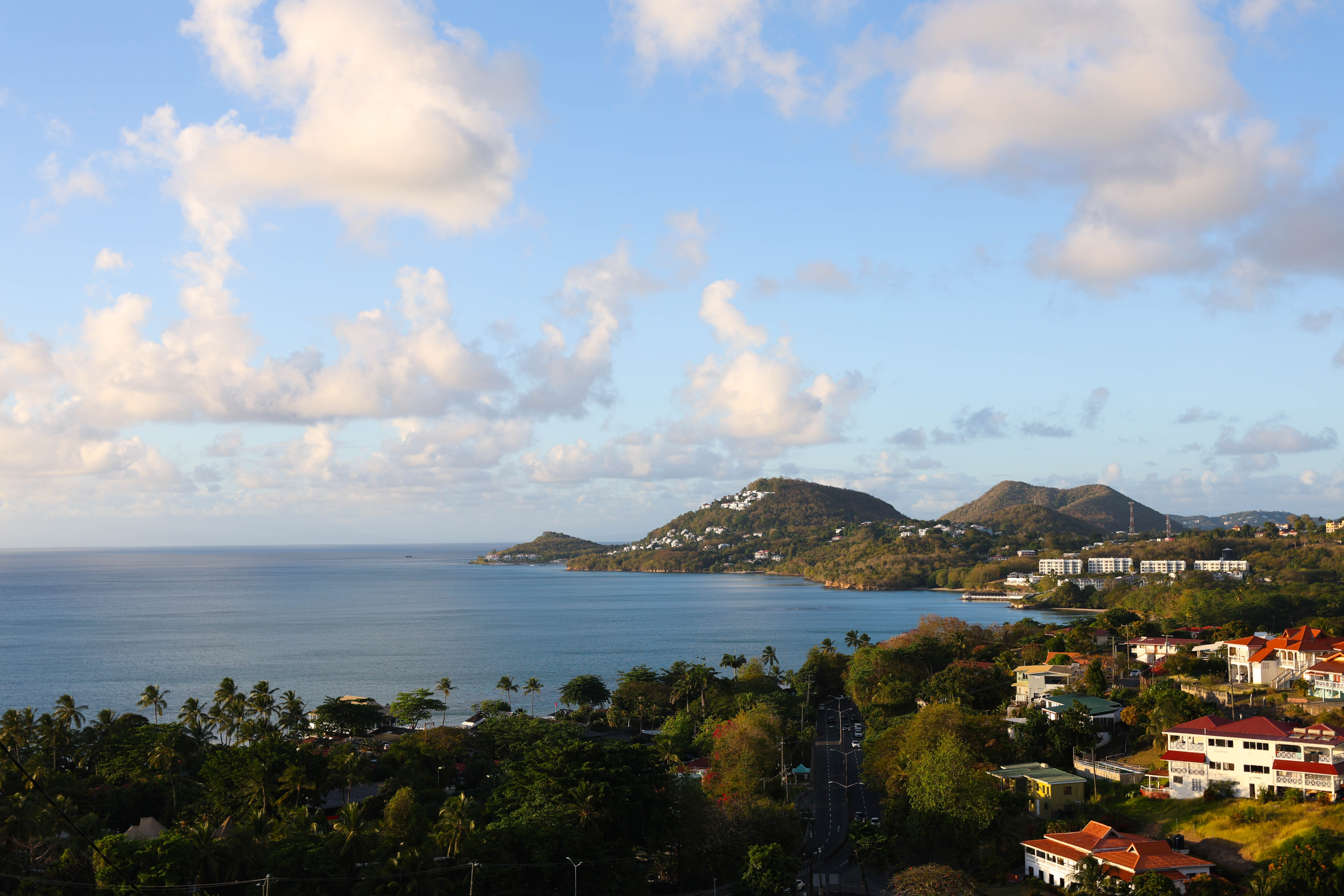 Panoramic aerial view of Castries Saint Lucia — Caribbean sea and green hills from Serene Sunset Escapes